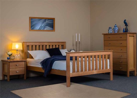 The Galligan Mitchell timber bedroom suite with two bedside tables, a timber bedframe and a tallboy dresser